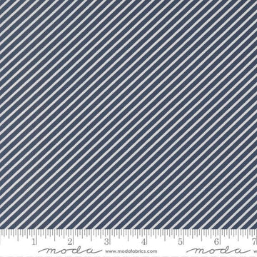 Image of Delightfully Yours Stripes Navy quilting cotton fabric by Sherri & Chelsi for Moda Fabrics. Features stripes on a blue background. Cute Little Fabric Shop
