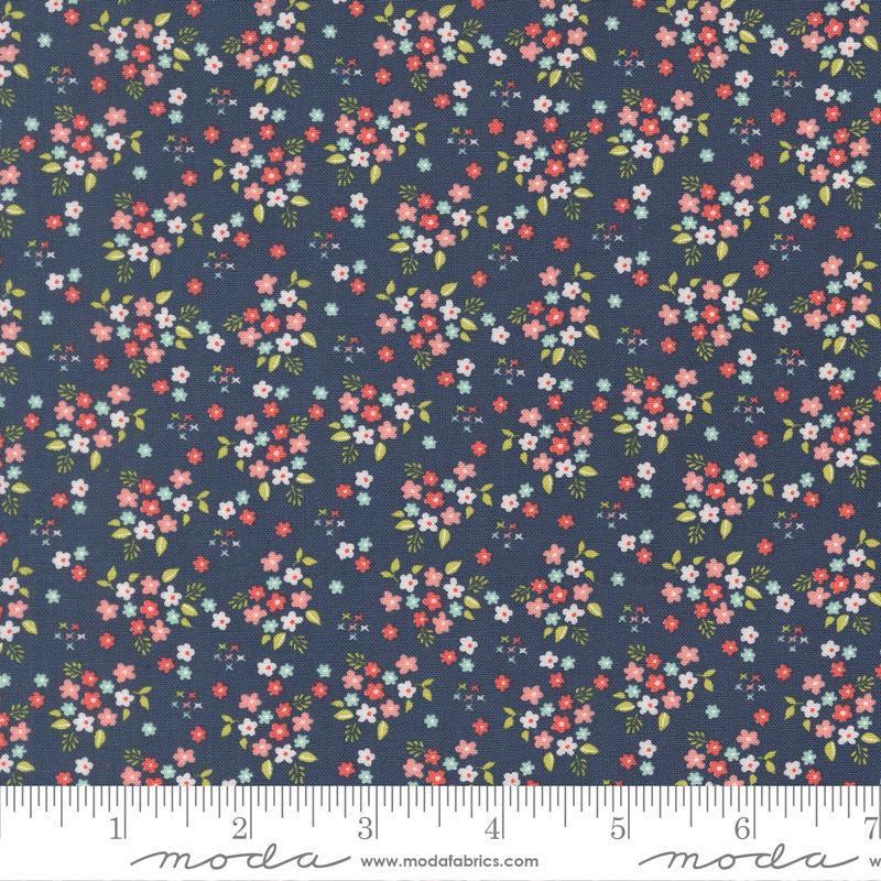 Image of Delightfully Yours Posie Navy quilting cotton fabric by Sherri & Chelsi for Moda Fabrics. Features flowers on a blue background. Cute Little Fabric Shop