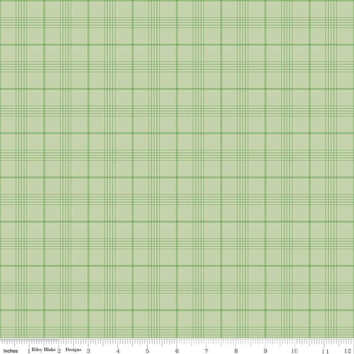 Image of Flannel Peter Rabbit™ & Friends Plaid Fern flannel cotton fabric by Riley Blake Official Licensed Product for Riley Blake Designs. Features checks on a green background. Cute Little Fabric Shop