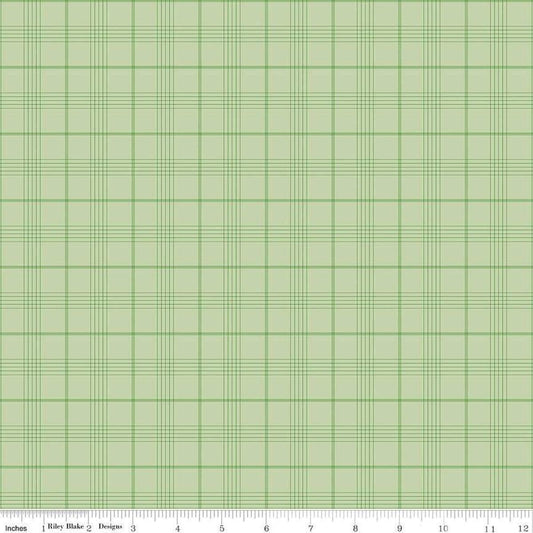 Image of Flannel Peter Rabbit™ & Friends Plaid Fern flannel cotton fabric by Riley Blake Official Licensed Product for Riley Blake Designs. Features checks on a green background. Cute Little Fabric Shop