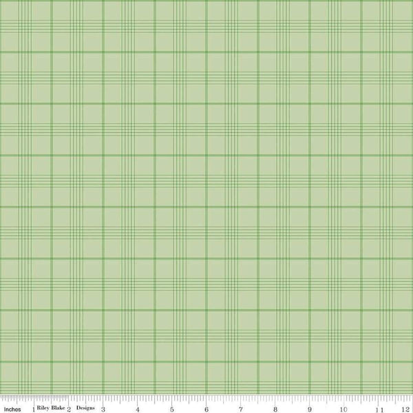 Image of Flannel Peter Rabbit™ & Friends Plaid Fern flannel cotton fabric by Riley Blake Official Licensed Product for Riley Blake Designs. Features checks on a green background. Cute Little Fabric Shop