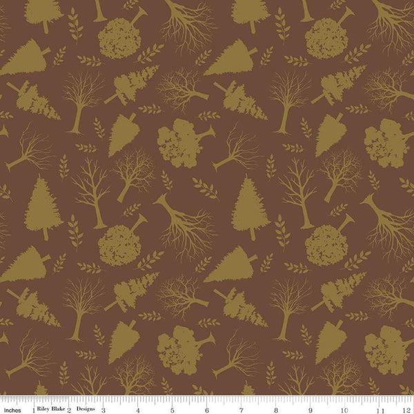 Image of Flannel Into the Woods Trees Brown flannel cotton fabric by Diane Labombarbe for Riley Blake Designs. Features plants on a brown background. Cute Little Fabric Shop