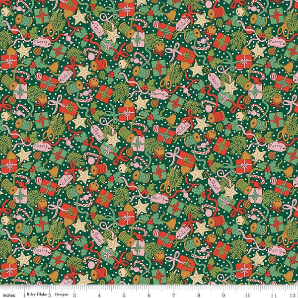 Image of Festive Greetings Festive Gifting quilting cotton fabric by Liberty Fabrics for Riley Blake Designs. Features presents on a green background. Cute Little Fabric Shop