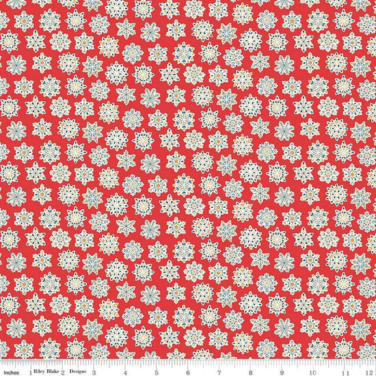 Image of Festive Greetings Snow Season quilting cotton fabric by Liberty Fabrics for Riley Blake Designs. Features snowflakes on a red background. Cute Little Fabric Shop