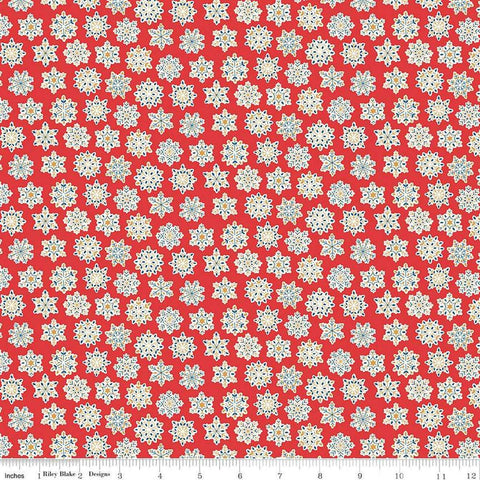 Image of Festive Greetings Snow Season quilting cotton fabric by Liberty Fabrics for Riley Blake Designs. Features snowflakes on a red background. Cute Little Fabric Shop