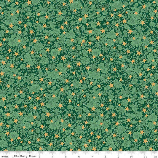 Image of Festive Greetings Emily Star quilting cotton fabric by Liberty Fabrics for Riley Blake Designs. Features stars on a green background. Cute Little Fabric Shop