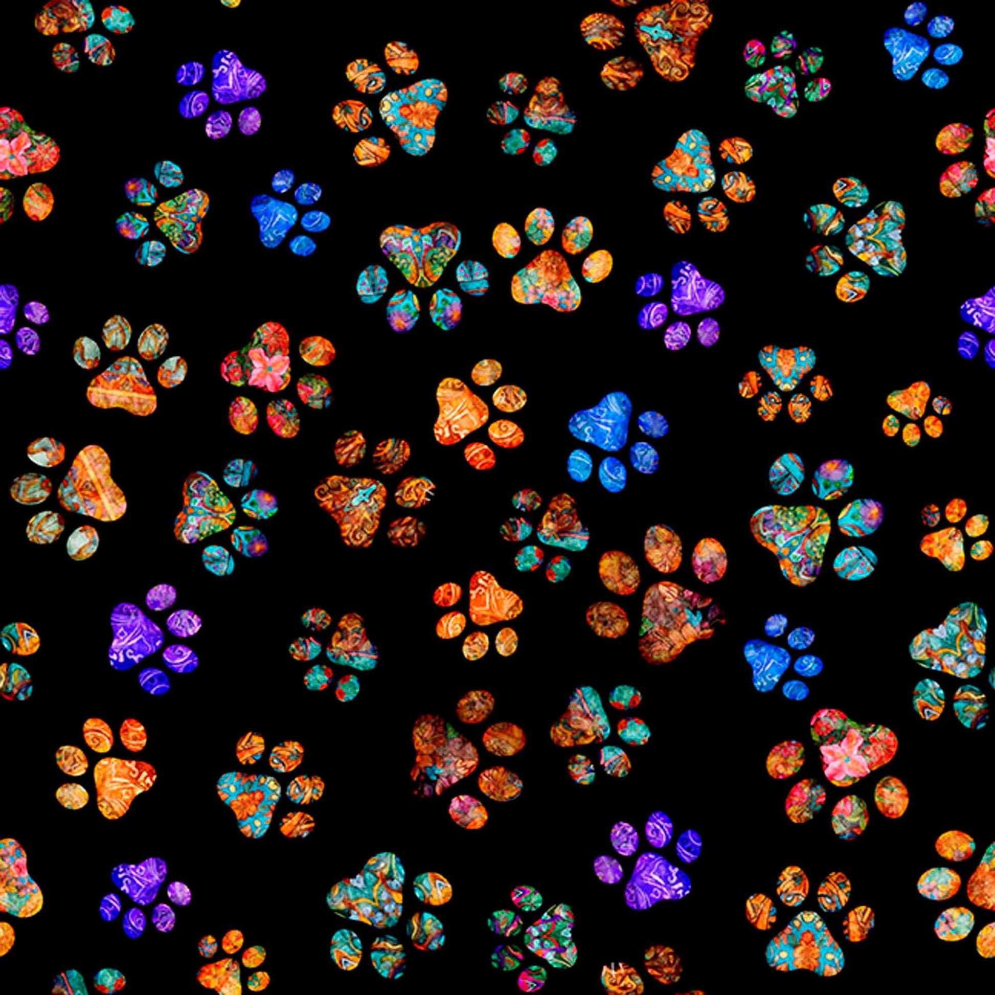 Image of Feline Fantasia Paw Prints Black quilting cotton fabric by Morris Creative Group for QT Fabrics. Features paw prints on a black background. Cute Little Fabric Shop