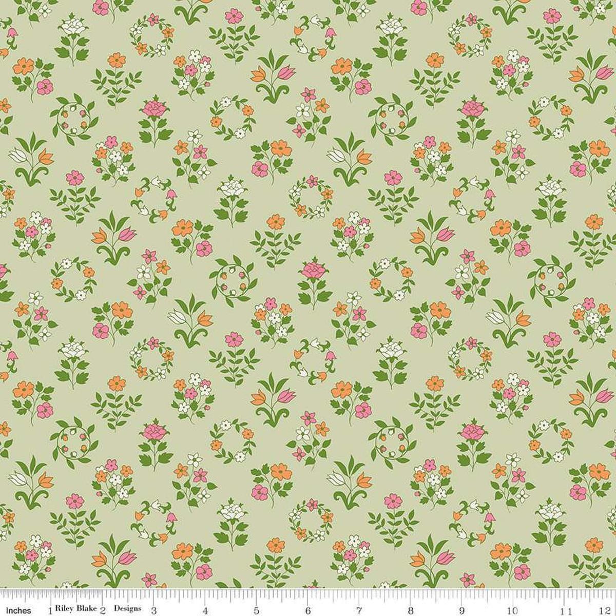 Image of Craft Garden Mary's Embroidery quilting cotton fabric by Liberty Fabrics for Riley Blake Designs. Features flowers on a green background. Cute Little Fabric Shop