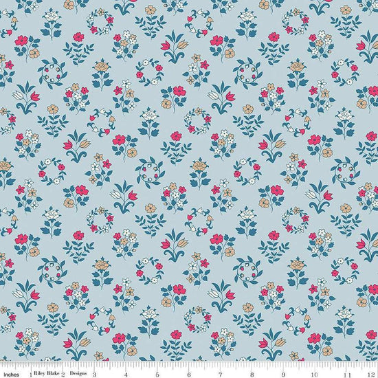 Image of Craft Garden Mary's Embroidery quilting cotton fabric by Liberty Fabrics for Riley Blake Designs. Features flowers on a blue background. Cute Little Fabric Shop