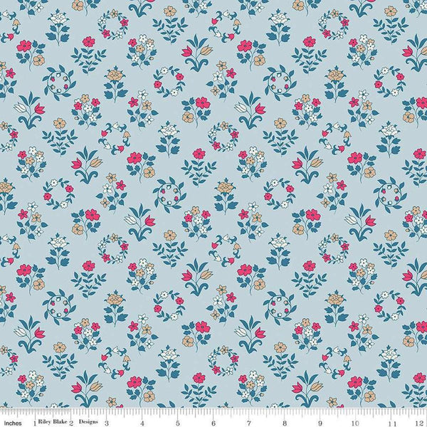 Image of Craft Garden Mary&#39;s Embroidery quilting cotton fabric by Liberty Fabrics for Riley Blake Designs. Features flowers on a blue background. Cute Little Fabric Shop