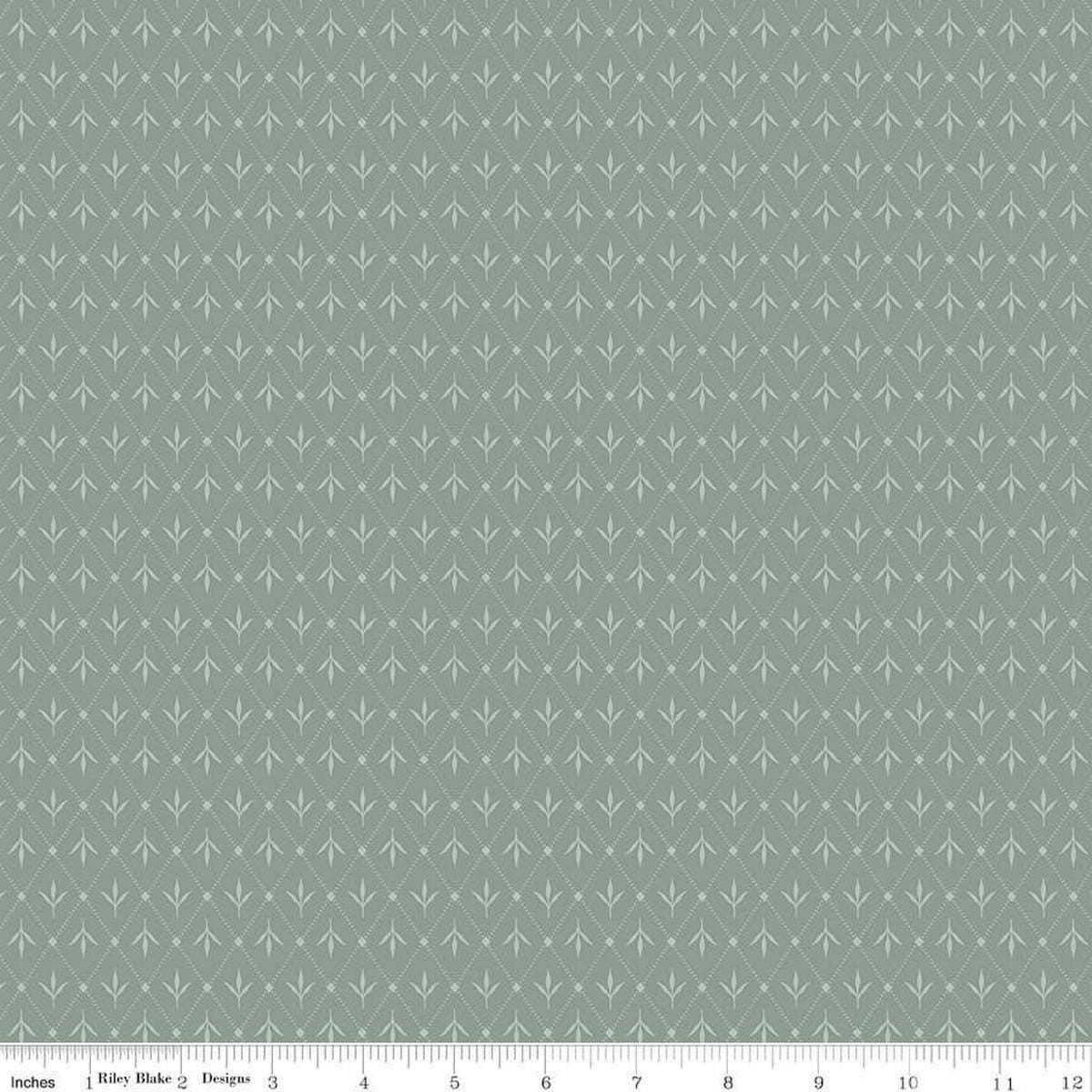 Image of Threads of Grace Ivy Dream quilting cotton fabric by Kassidy Grace for Riley Blake Designs. Features leaves on a blue background. Cute Little Fabric Shop