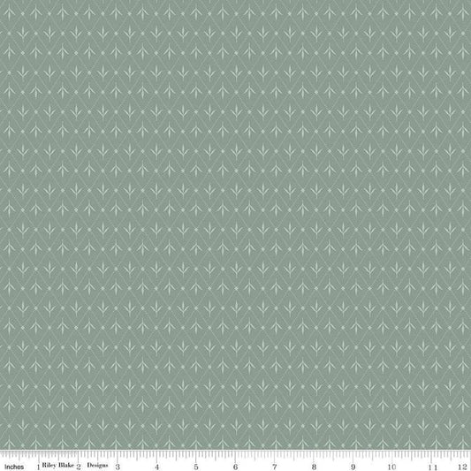 Image of Threads of Grace Ivy Dream quilting cotton fabric by Kassidy Grace for Riley Blake Designs. Features leaves on a blue background. Cute Little Fabric Shop