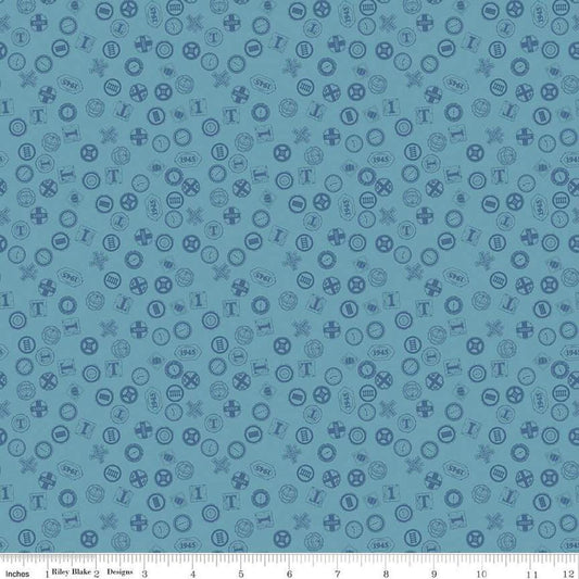 Image of Thomas & Friends™ 80th Anniversary Railroad Signs Blue quilting cotton fabric by Riley Blake Official Licensed Product for Riley Blake Designs. Features signs on a blue background. Cute Little Fabric Shop