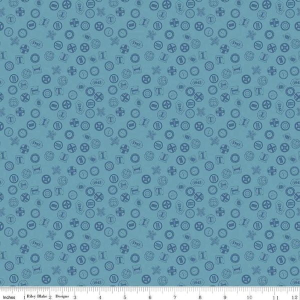 Image of Thomas & Friends™ 80th Anniversary Railroad Signs Blue quilting cotton fabric by Riley Blake Official Licensed Product for Riley Blake Designs. Features signs on a blue background. Cute Little Fabric Shop