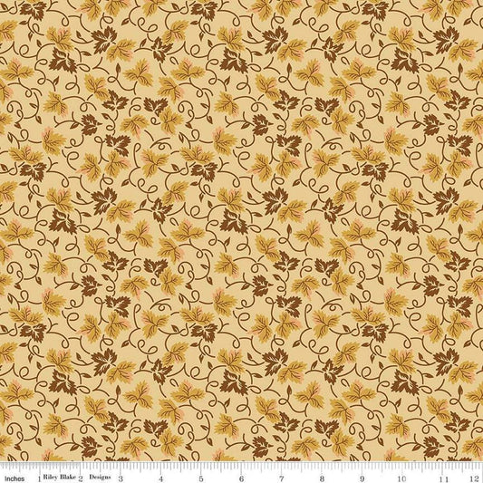 Image of Vera's Garden Leaves Gold quilting cotton fabric by Vicki McCarty for Riley Blake Designs. Features leaves on a yellow background. Cute Little Fabric Shop