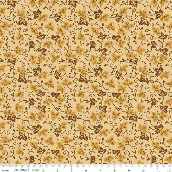 Image of Vera&#39;s Garden Leaves Gold quilting cotton fabric by Vicki McCarty for Riley Blake Designs. Features leaves on a yellow background. Cute Little Fabric Shop