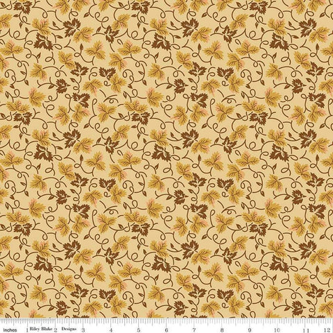 Image of Vera&#39;s Garden Leaves Gold quilting cotton fabric by Vicki McCarty for Riley Blake Designs. Features leaves on a yellow background. Cute Little Fabric Shop
