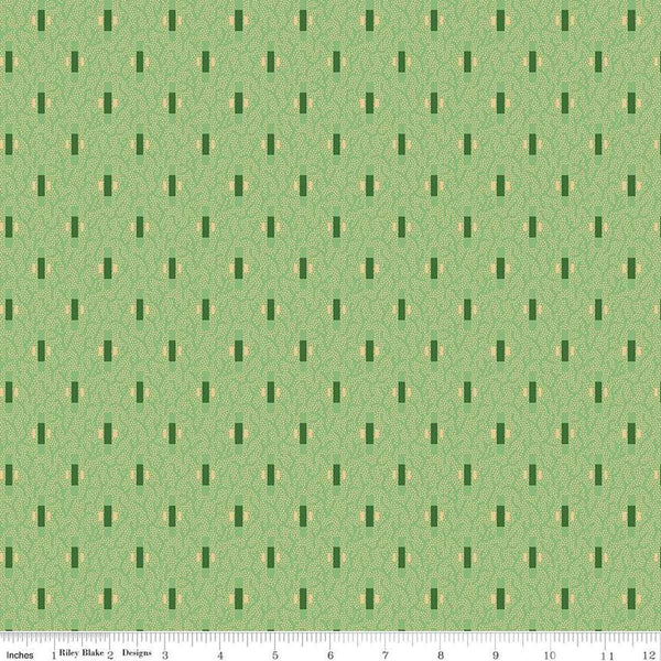 Image of Vera&#39;s Garden Dashes Green quilting cotton fabric by Vicki McCarty for Riley Blake Designs. Features shapes on a green background. Cute Little Fabric Shop