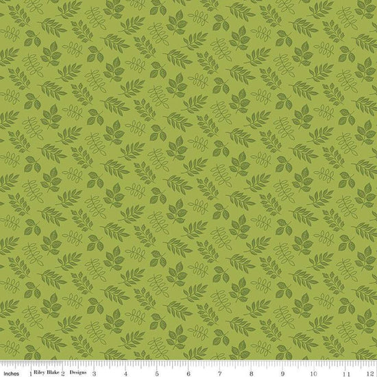 Image of Little Darlin' Leaves Green quilting cotton fabric by the RBD Designers for Riley Blake Designs. Features leaves on a green background. Cute Little Fabric Shop