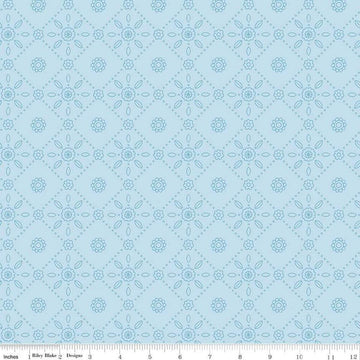 Image of Little Darlin' Folk Tile Blue quilting cotton fabric by the RBD Designers for Riley Blake Designs. Features shapes on a blue background. Cute Little Fabric Shop