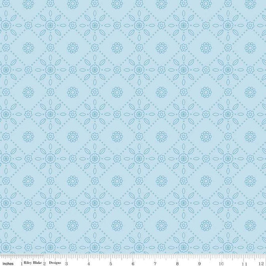 Image of Little Darlin' Folk Tile Blue quilting cotton fabric by the RBD Designers for Riley Blake Designs. Features shapes on a blue background. Cute Little Fabric Shop