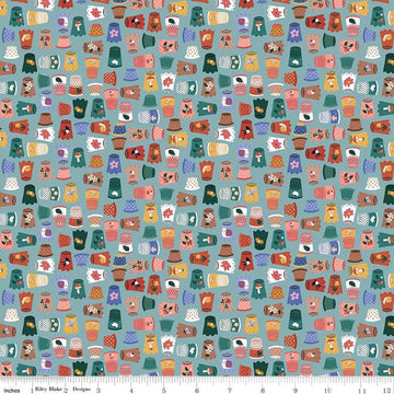 Image of Thimbelina & The Sewing Fairies Thimble Collection Mist quilting cotton fabric by Jennifer Long for Riley Blake Designs. Features thimbles on a blue background. Cute Little Fabric Shop