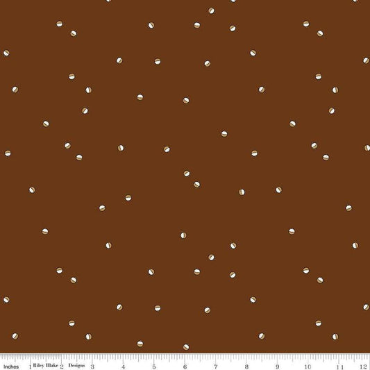 Image of Let's Wander Bobbers Brown quilting cotton fabric by Casey Cometti for Riley Blake Designs. Features bobbers on a brown background. Cute Little Fabric Shop