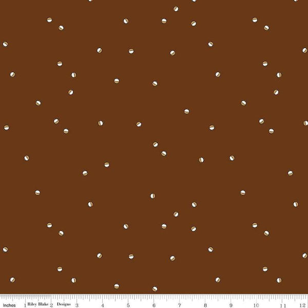 Image of Let&#39;s Wander Bobbers Brown quilting cotton fabric by Casey Cometti for Riley Blake Designs. Features bobbers on a brown background. Cute Little Fabric Shop