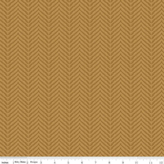 Image of Let's Wander Prairie Grass Golden quilting cotton fabric by Casey Cometti for Riley Blake Designs. Features leaves on a gold background. Cute Little Fabric Shop