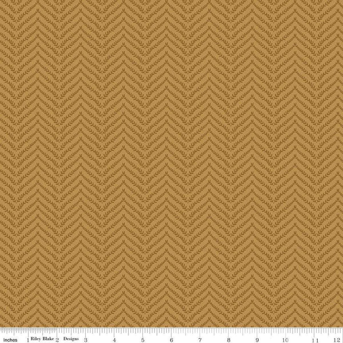 Image of Let's Wander Prairie Grass Golden quilting cotton fabric by Casey Cometti for Riley Blake Designs. Features leaves on a gold background. Cute Little Fabric Shop