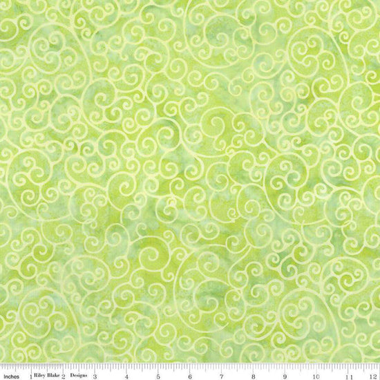 Image of Expressions Batiks Radiant Flourish Pale Lime quilting cotton fabric by The RBD Designers for Riley Blake Designs. Features swirls on a green background. Cute Little Fabric Shop