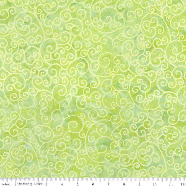 Image of Expressions Batiks Radiant Flourish Pale Lime quilting cotton fabric by The RBD Designers for Riley Blake Designs. Features swirls on a green background. Cute Little Fabric Shop