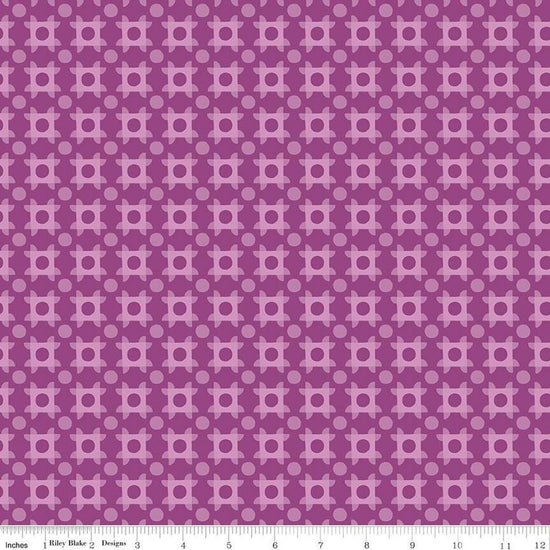 Image of The Genesis of a Journey Patchwork Piazza Grape quilting cotton fabric by Genesis Hall for Riley Blake Designs. Features squares on a purple background. Cute Little Fabric Shop