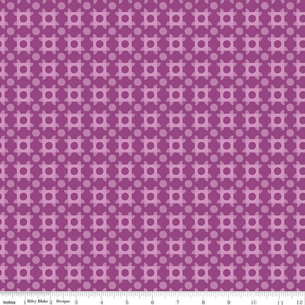 Image of The Genesis of a Journey Patchwork Piazza Grape quilting cotton fabric by Genesis Hall for Riley Blake Designs. Features squares on a purple background. Cute Little Fabric Shop