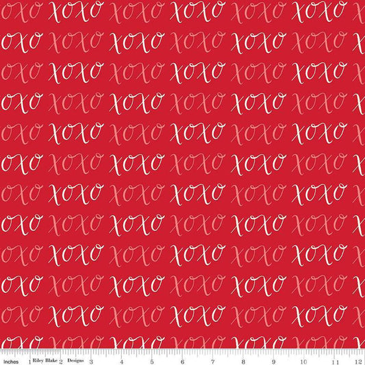 Image of Letters to Cupid XOXO Red quilting cotton fabric by My Mind's Eye for Riley Blake Designs. Features writing on a red background. Cute Little Fabric Shop