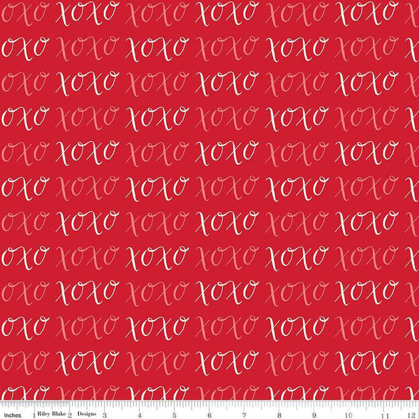 Image of Letters to Cupid XOXO Red quilting cotton fabric by My Mind&#39;s Eye for Riley Blake Designs. Features writing on a red background. Cute Little Fabric Shop