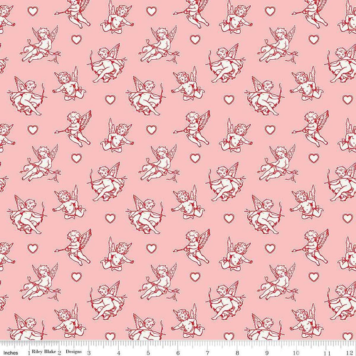 Image of Letters to Cupid Cupids Pink quilting cotton fabric by My Mind's Eye for Riley Blake Designs. Features cupids on a pink background. Cute Little Fabric Shop