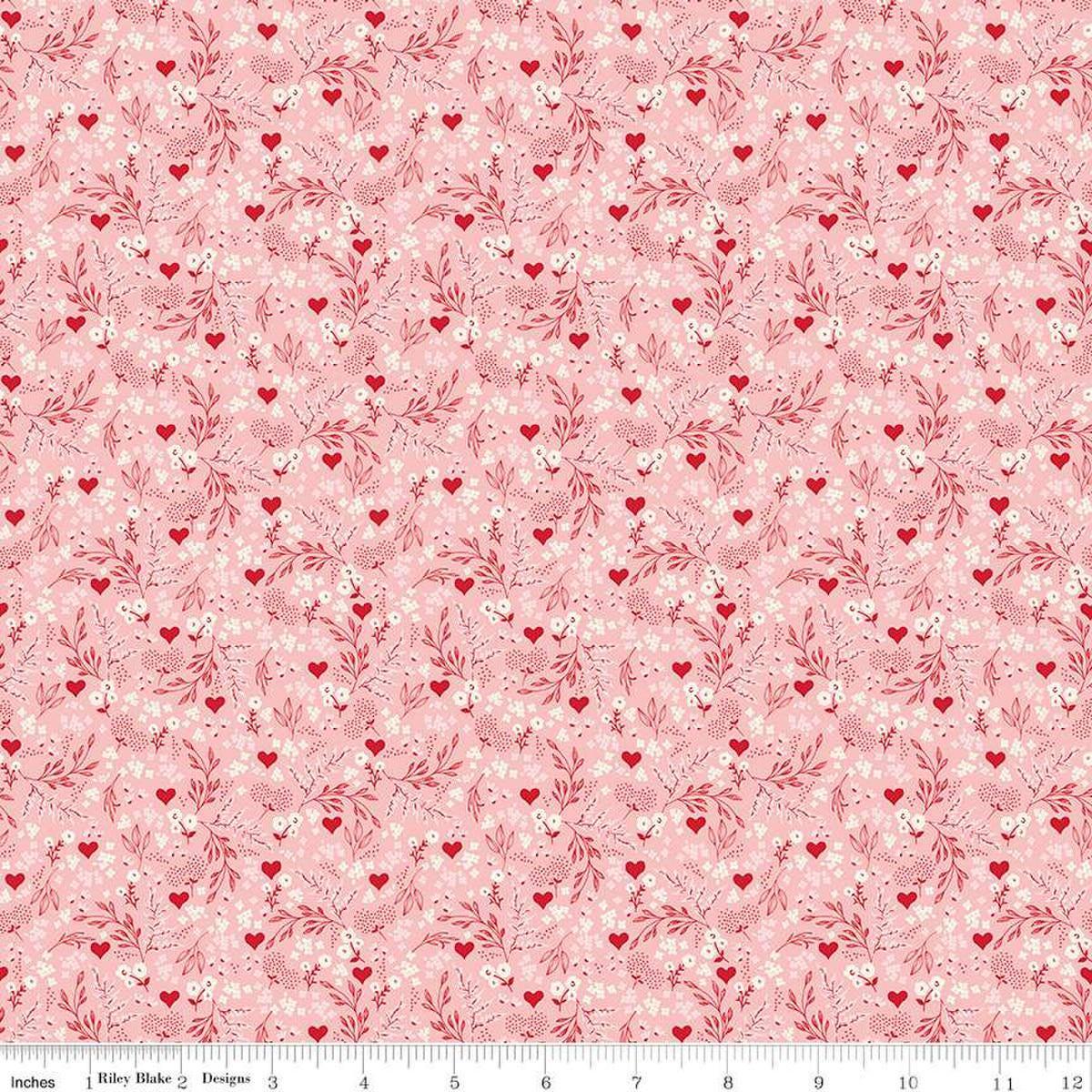 Image of Letters to Cupid Ditsy Floral Pink quilting cotton fabric by My Mind's Eye for Riley Blake Designs. Features flowers on a pink background. Cute Little Fabric Shop