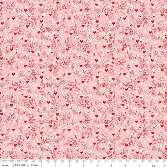 Image of Letters to Cupid Ditsy Floral Pink quilting cotton fabric by My Mind's Eye for Riley Blake Designs. Features flowers on a pink background. Cute Little Fabric Shop