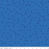 Image of On The Dot Sapphire quilting cotton fabric by Sew Yeah Quilting for Riley Blake Designs. Features dots on a blue background. Cute Little Fabric Shop