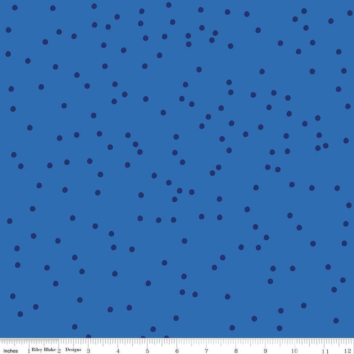 Image of On The Dot Sapphire quilting cotton fabric by Sew Yeah Quilting for Riley Blake Designs. Features dots on a blue background. Cute Little Fabric Shop
