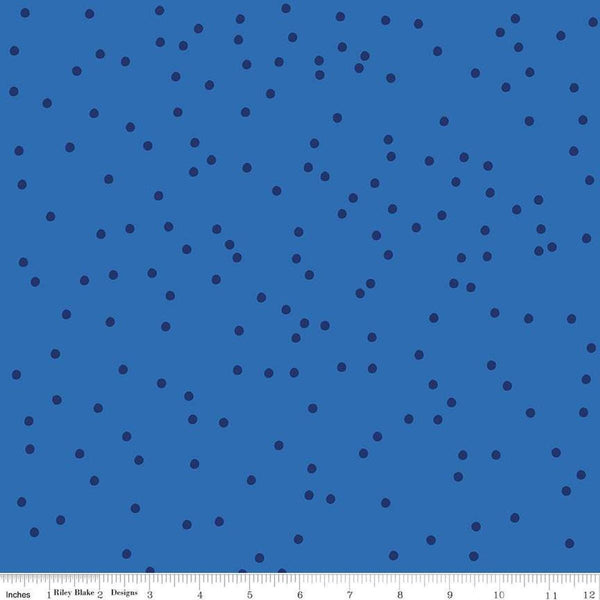Image of On The Dot Sapphire quilting cotton fabric by Sew Yeah Quilting for Riley Blake Designs. Features dots on a blue background. Cute Little Fabric Shop