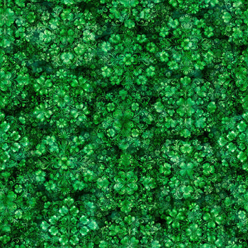Image of Spirit of Ireland Shamrock Clusters Green quilting cotton fabric by Morris Creative Group for QT Fabrics. Features clovers on a green background. Cute Little Fabric Shop