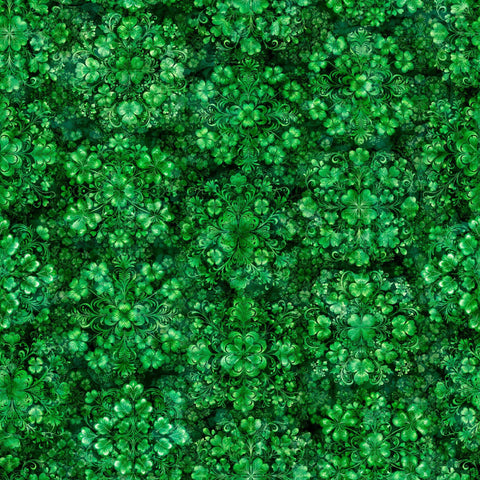 Image of Spirit of Ireland Shamrock Clusters Green quilting cotton fabric by Morris Creative Group for QT Fabrics. Features clovers on a green background. Cute Little Fabric Shop