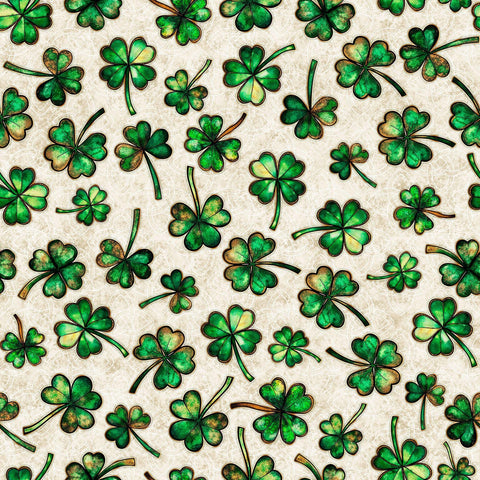 Image of Spirit of Ireland Shamrocks Tan quilting cotton fabric by Morris Creative Group for QT Fabrics. Features clovers on a cream background. Cute Little Fabric Shop