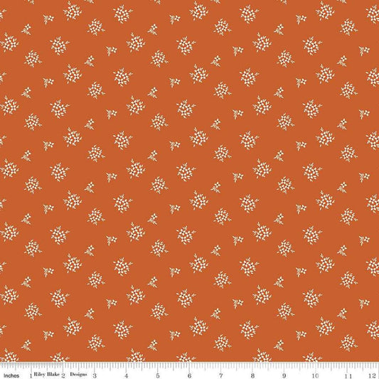 Image of Morning Latte Ditsy Spice quilting cotton fabric by Sandy Gervais for Riley Blake Designs. Features flowers on an orange background. Cute Little Fabric Shop