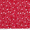 Image of Expressions Batiks Love Punch Sassy quilting cotton fabric by The RBD Designers for Riley Blake Designs. Features hearts on a red background. Cute Little Fabric Shop