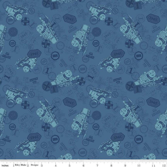 Image of Thomas & Friends™ 80th Anniversary Tonal Toss Denim quilting cotton fabric by Riley Blake Official Licensed Product for Riley Blake Designs. Features train signs on a blue background. Cute Little Fabric Shop