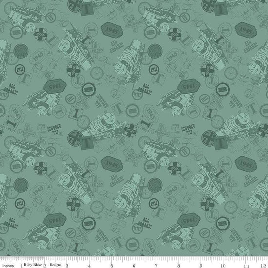 Image of Thomas & Friends™ 80th Anniversary Tonal Toss Green quilting cotton fabric by Riley Blake Official Licensed Product for Riley Blake Designs. Features train signs on a green background. Cute Little Fabric Shop