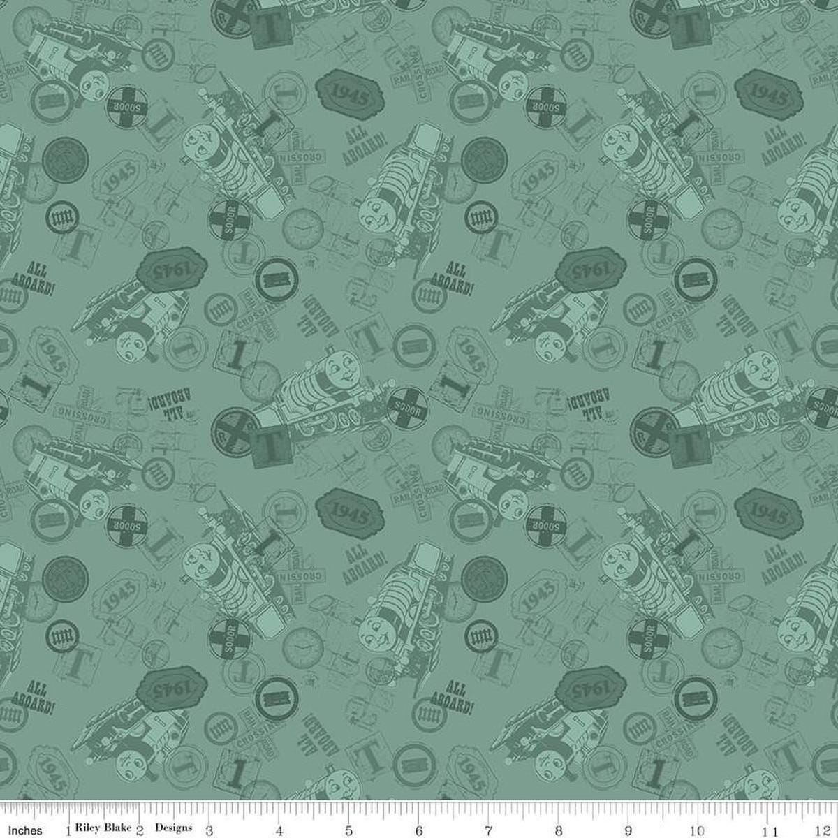 Image of Thomas & Friends™ 80th Anniversary Tonal Toss Green quilting cotton fabric by Riley Blake Official Licensed Product for Riley Blake Designs. Features train signs on a green background. Cute Little Fabric Shop